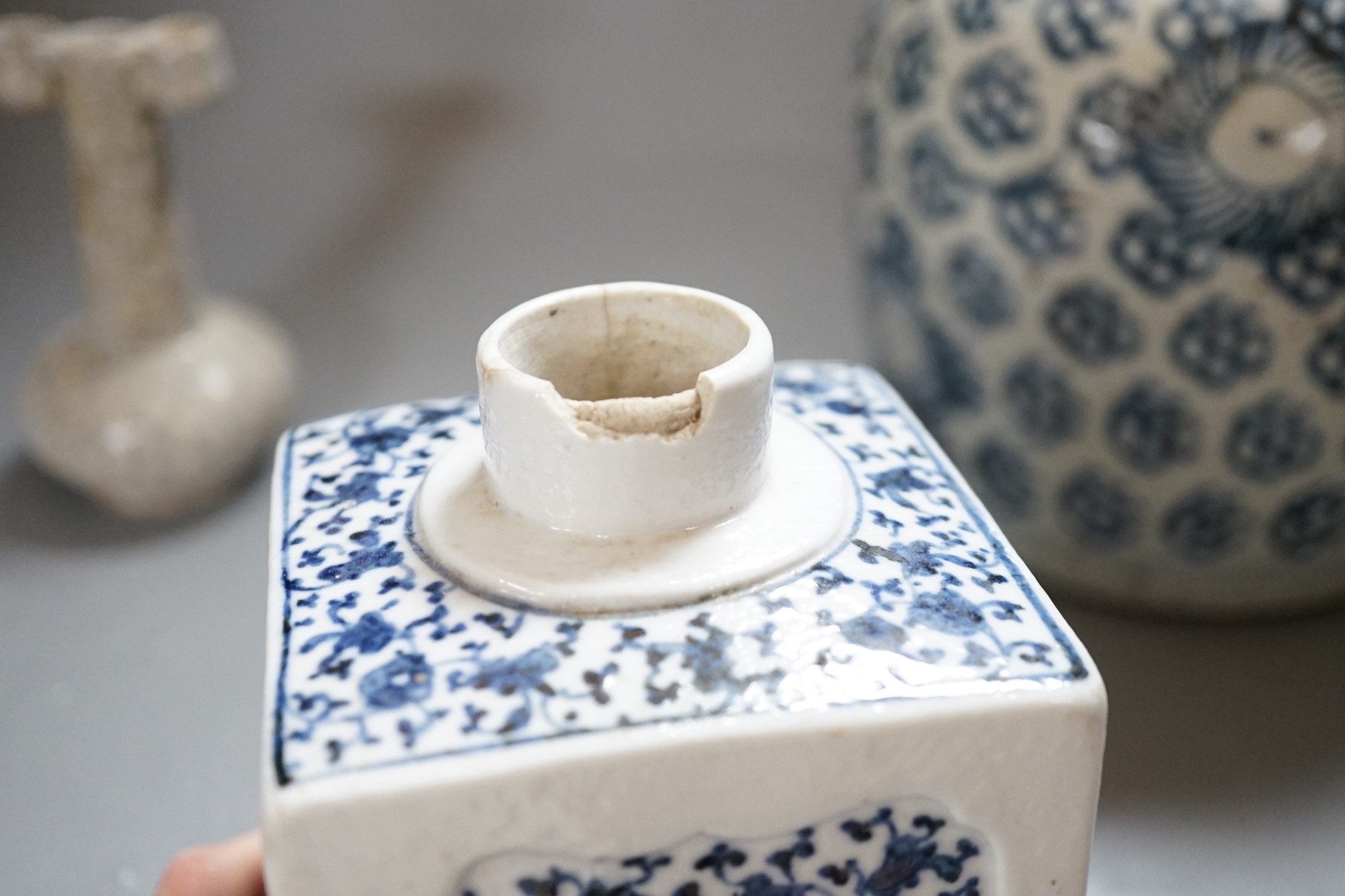An 18th century Chinese provincial jar together with a tea canister and crackleglaze vase, tallest 18.5cm